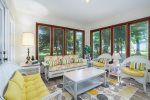 Enjoy a meal in the sun room overlooking Lake Michigan 